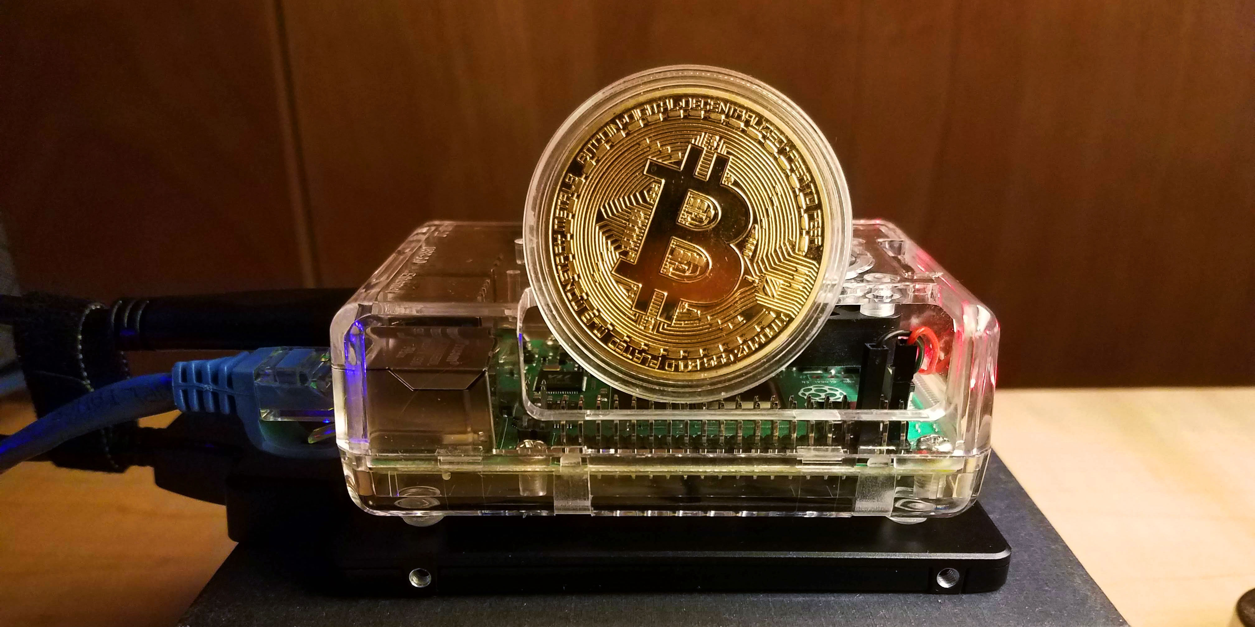 An image of a small computer (Raspberry Pi) running a Bitcoin Node.